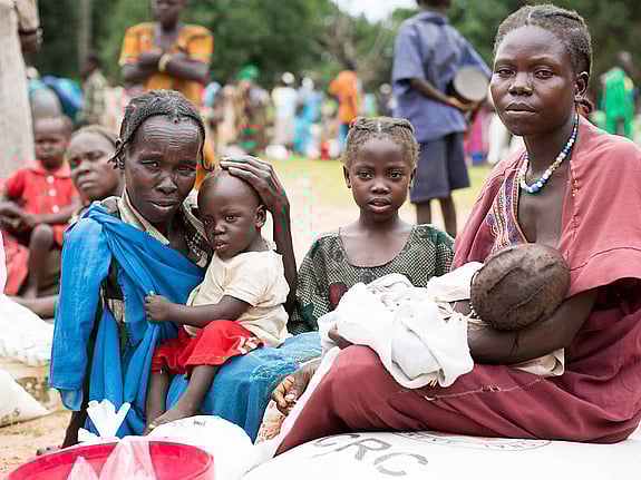 Kvinna med barnaskara