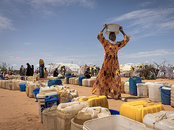 Kvinna på flykt i Sudan i flyktingläger.