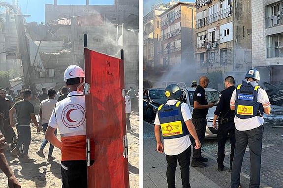 Hjälparbetare tar hand om skadade i Israel