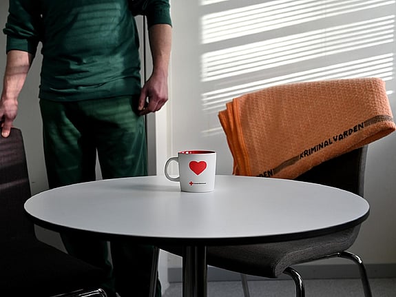 Table with coffee cup.
